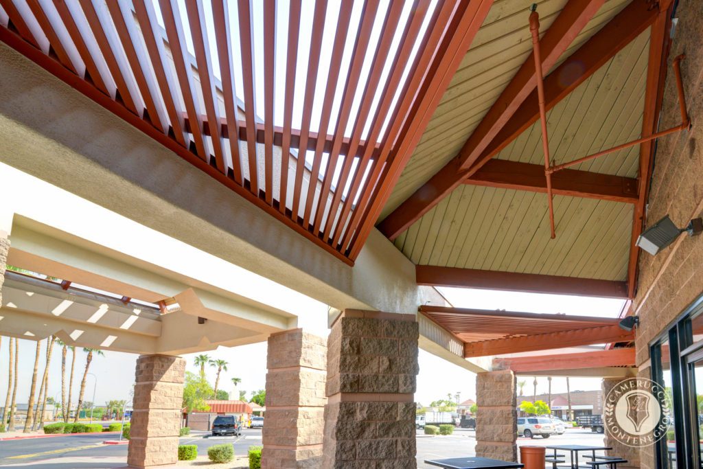 A building with a roof that has been painted.
