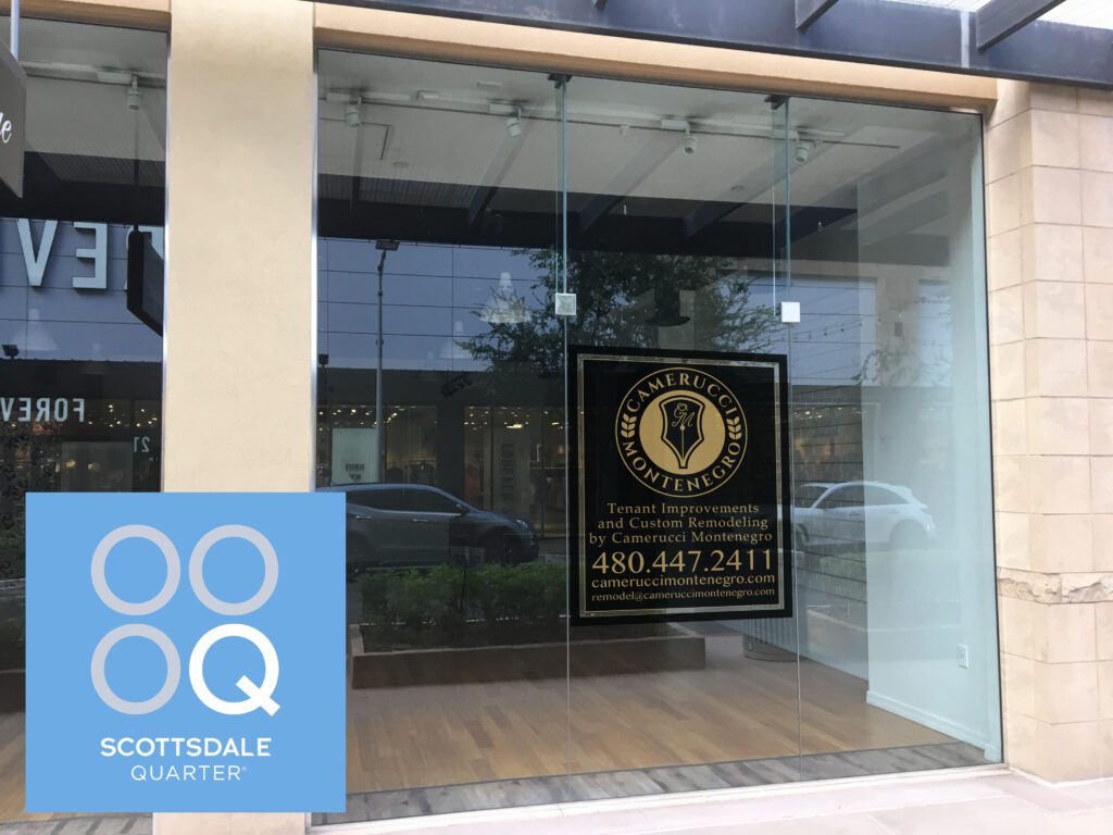 A glass door with a sign on it