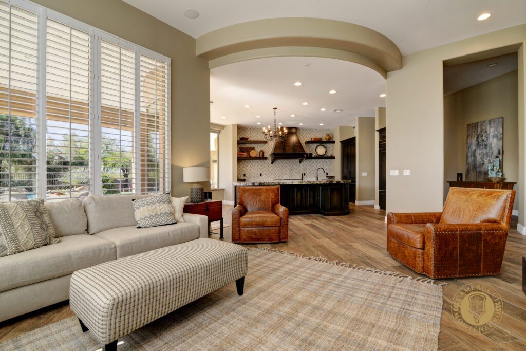 A living room with couches and chairs in it
