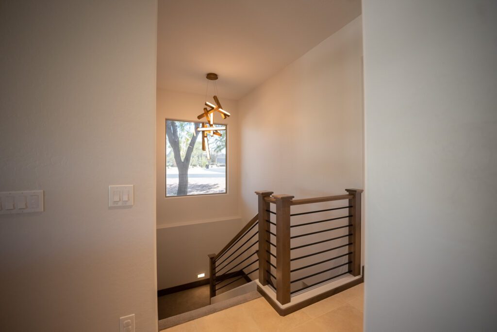 A view of the stairs from the hallway.